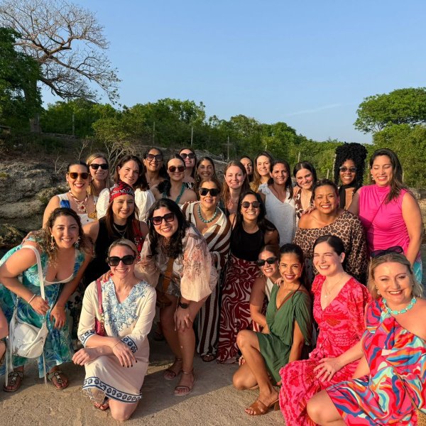 AIJA Women Network group photo by the sea